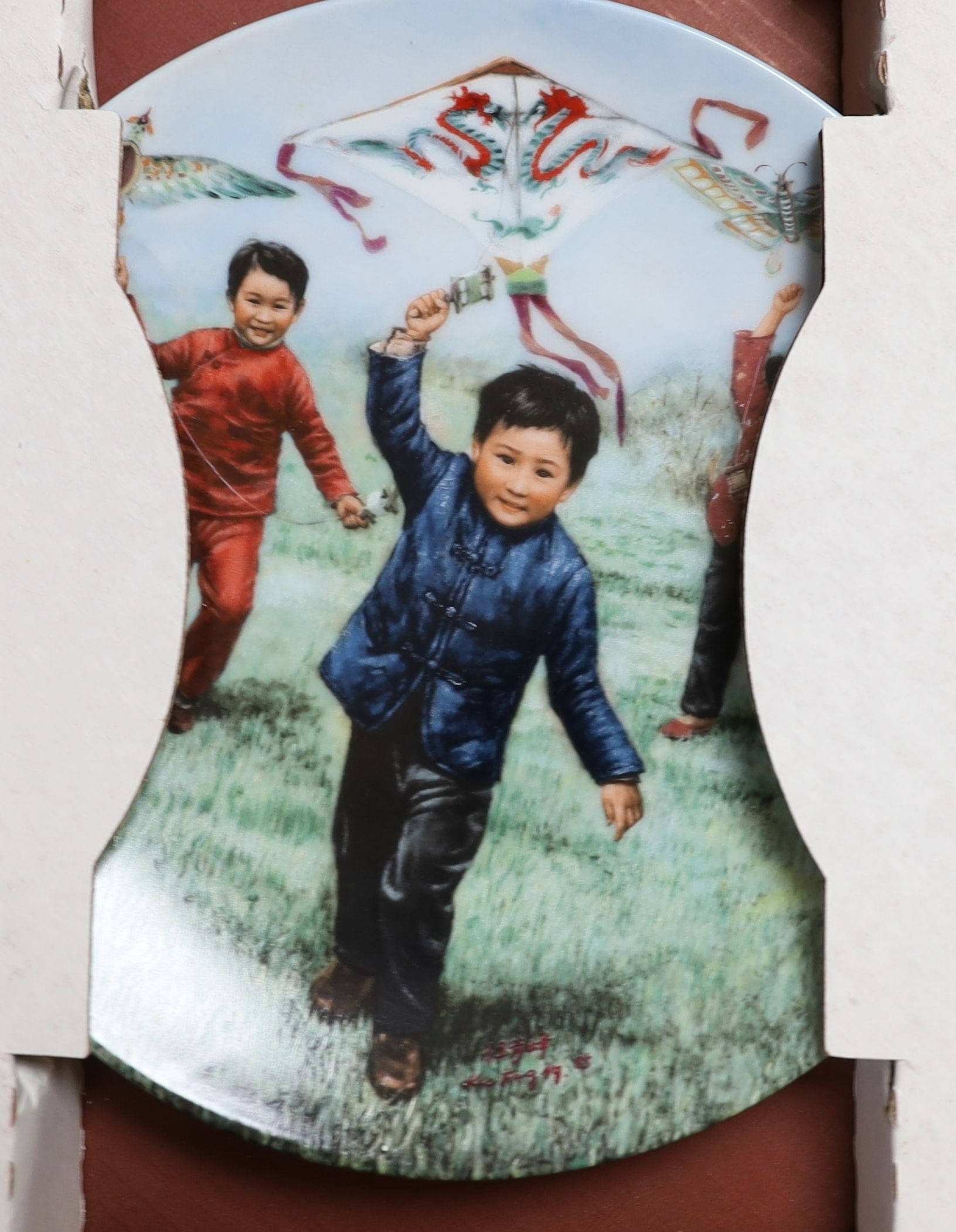 A set of six Chinese collector's plates in original boxes